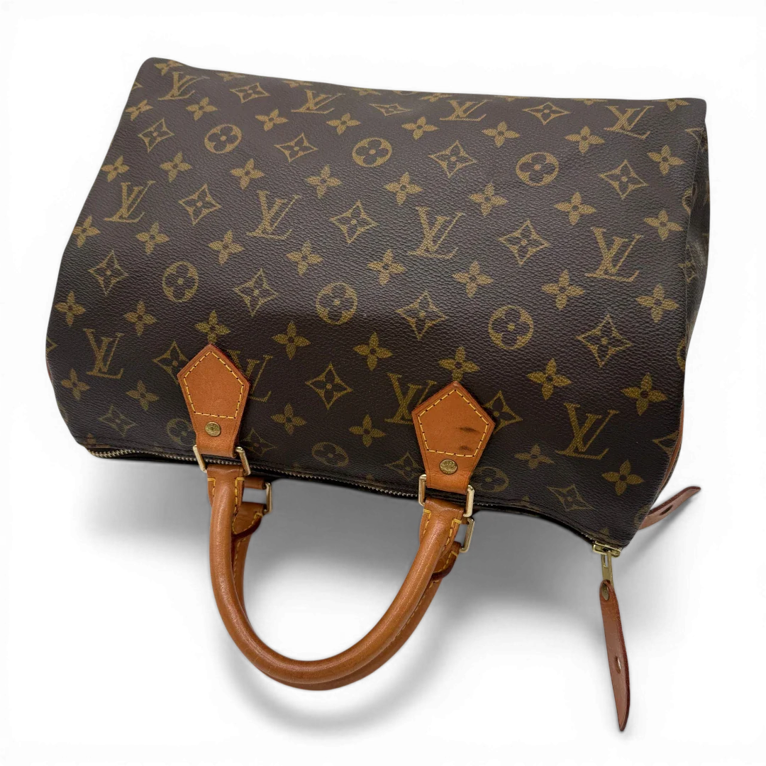 https://cdn.shopify.com/s/files/1/0564/9376/8855/files/Louis_Vuitton_Handtasche_Speedy_30_monogram_braun_vintage_LV4347.webp?v=1776345115