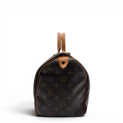 https://cdn.shopify.com/s/files/1/0564/9376/8855/files/Louis_Vuitton_Handtasche_Speedy_30_monogram_braun_vintage_LV7390.webp?v=1778667068