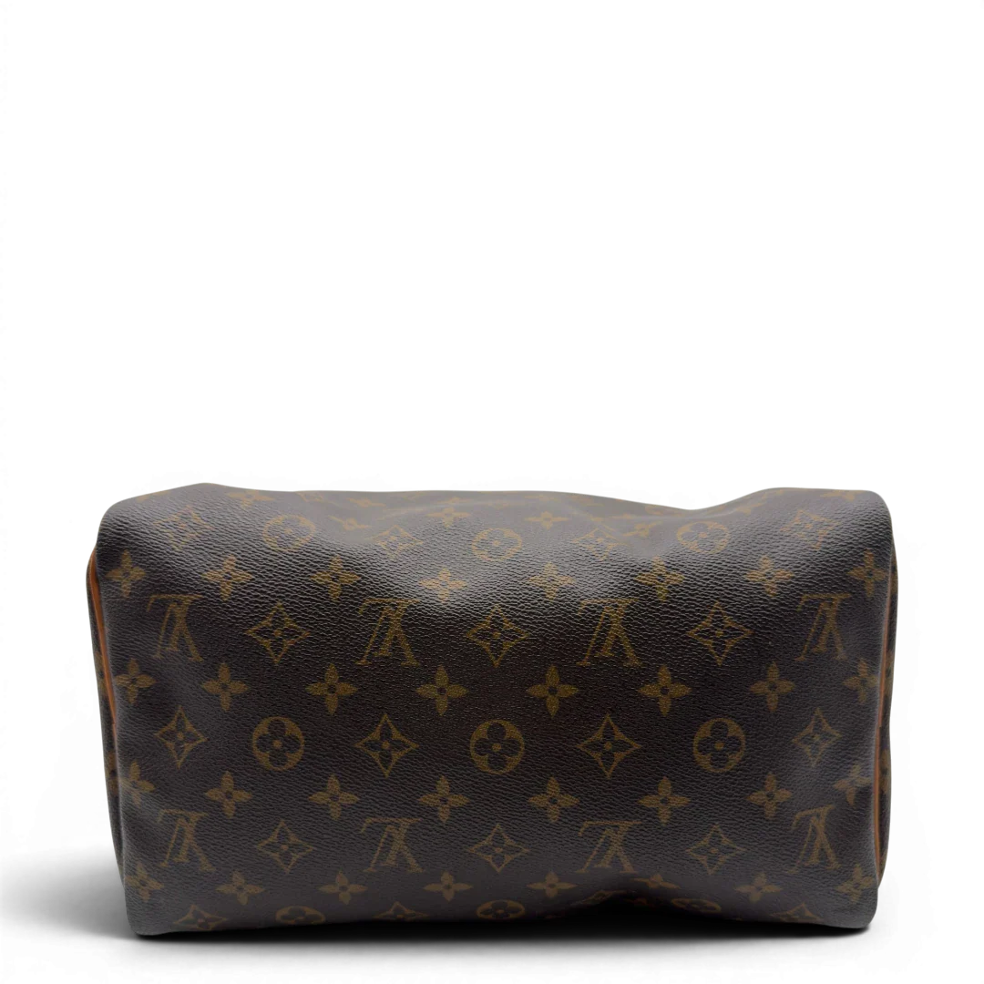 https://cdn.shopify.com/s/files/1/0564/9376/8855/files/Louis_Vuitton_Handtasche_Speedy_30_monogram_braun_vintage_LV7391.webp?v=1778667068