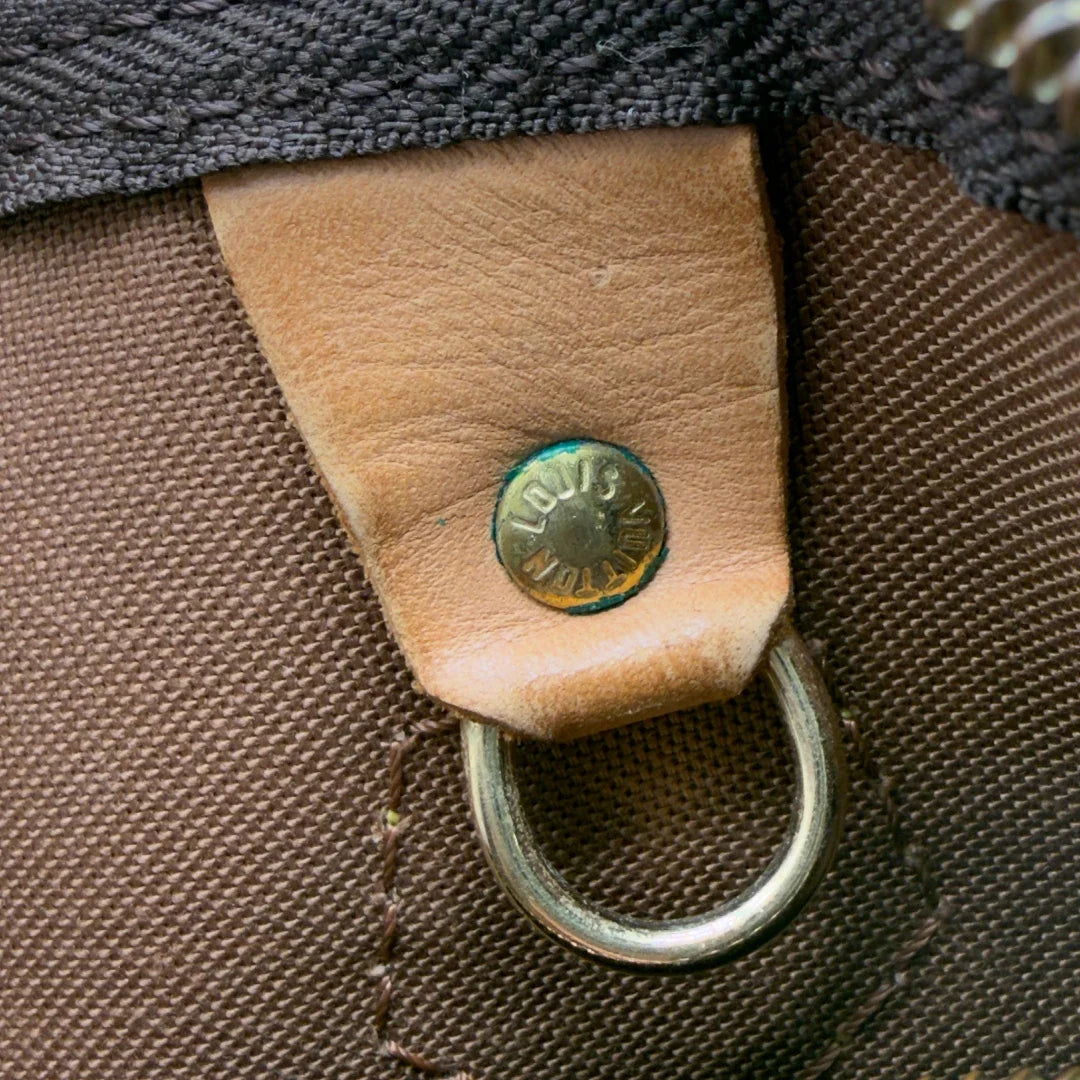 https://cdn.shopify.com/s/files/1/0564/9376/8855/files/Louis_Vuitton_Handtasche_Speedy_30_monogram_braun_vintage_LV7402.webp?v=1778667069