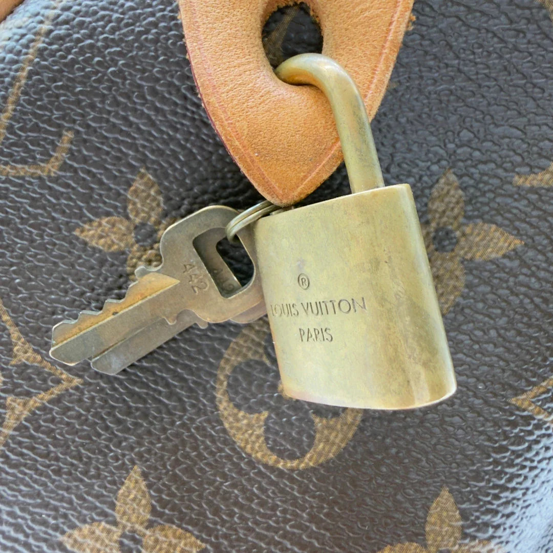 https://cdn.shopify.com/s/files/1/0564/9376/8855/files/Louis_Vuitton_Handtasche_Speedy_30_monogram_braun_vintage_LV8423.webp?v=1780486189