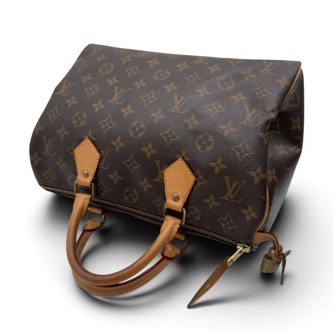 https://cdn.shopify.com/s/files/1/0564/9376/8855/files/Louis_Vuitton_Handtasche_Speedy_30_monogram_braun_vintage_LV8431.webp?v=1780486190