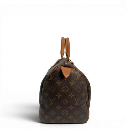 https://cdn.shopify.com/s/files/1/0564/9376/8855/files/Louis_Vuitton_Handtasche_Speedy_30_monogram_braun_vintage_LV8770.webp?v=1781052572