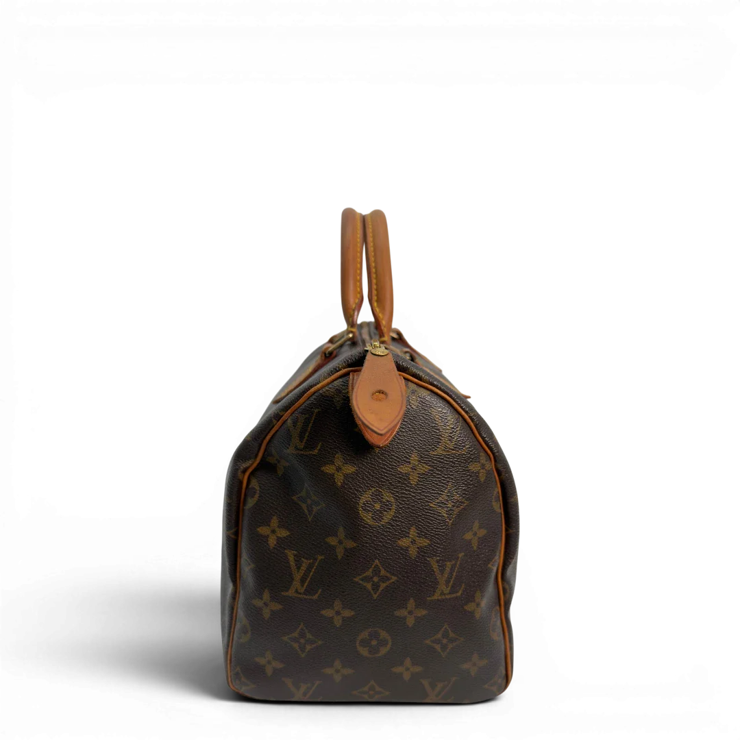https://cdn.shopify.com/s/files/1/0564/9376/8855/files/Louis_Vuitton_Handtasche_Speedy_30_monogram_braun_vintage_LV8771.webp?v=1781052572