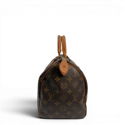 https://cdn.shopify.com/s/files/1/0564/9376/8855/files/Louis_Vuitton_Handtasche_Speedy_30_monogram_braun_vintage_LV8771.webp?v=1781052572