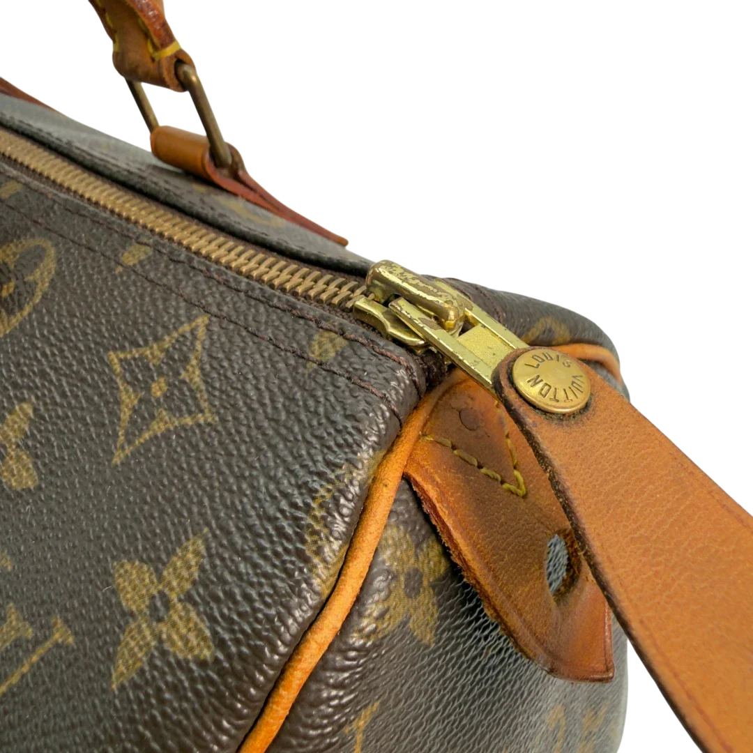 https://cdn.shopify.com/s/files/1/0564/9376/8855/files/Louis_Vuitton_Handtasche_Speedy_30_monogram_braun_vintage_LV8779.webp?v=1781052572