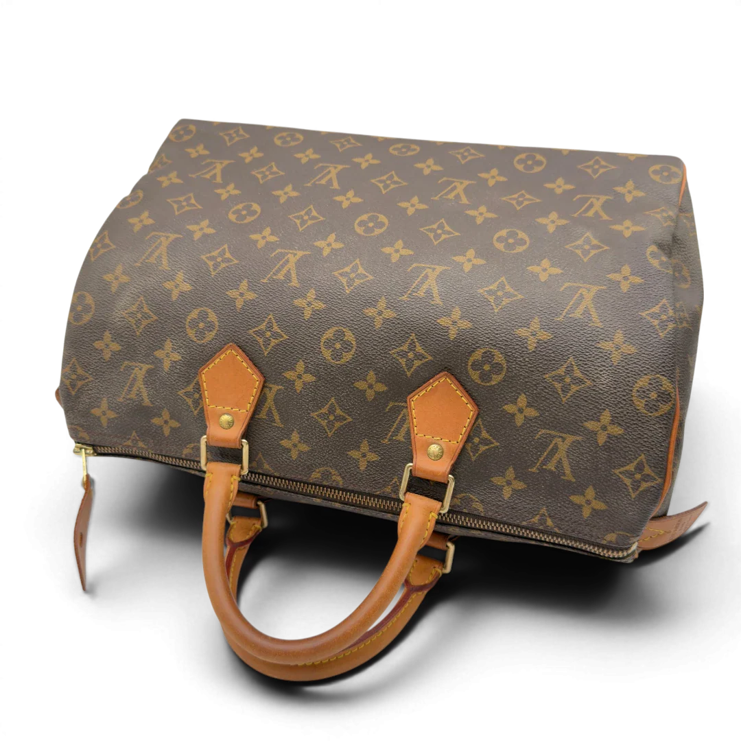 https://cdn.shopify.com/s/files/1/0564/9376/8855/files/Louis_Vuitton_Handtasche_Speedy_35_monogram_braun_10.webp?v=1782910257