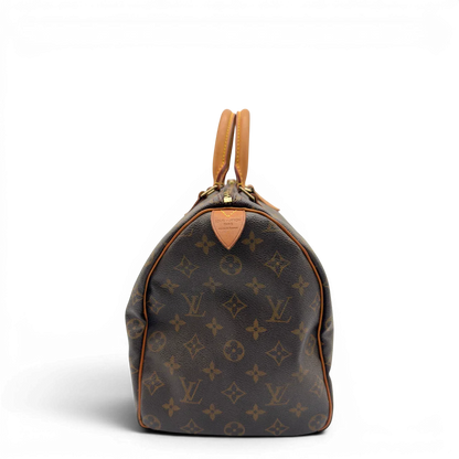 https://cdn.shopify.com/s/files/1/0564/9376/8855/files/Louis_Vuitton_Handtasche_Speedy_35_monogram_braun_4.webp?v=1782910256