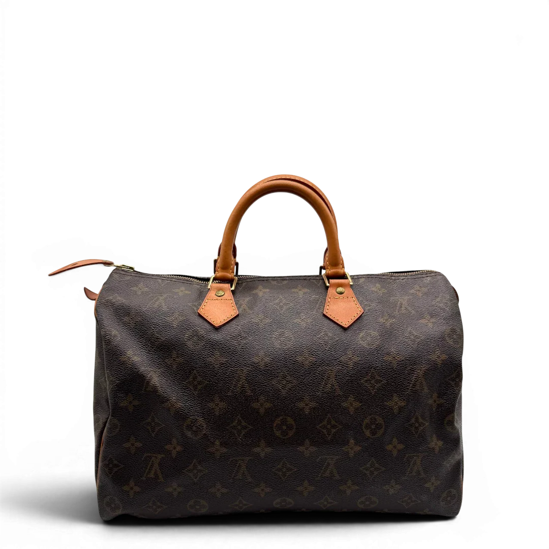 https://cdn.shopify.com/s/files/1/0564/9376/8855/files/Louis_Vuitton_Handtasche_Speedy_35_monogram_braun_vintage_LV1707.webp?v=1779408579