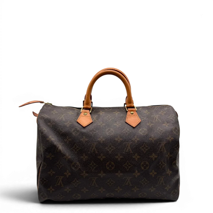 https://cdn.shopify.com/s/files/1/0564/9376/8855/files/Louis_Vuitton_Handtasche_Speedy_35_monogram_braun_vintage_LV1707.webp?v=1779408579