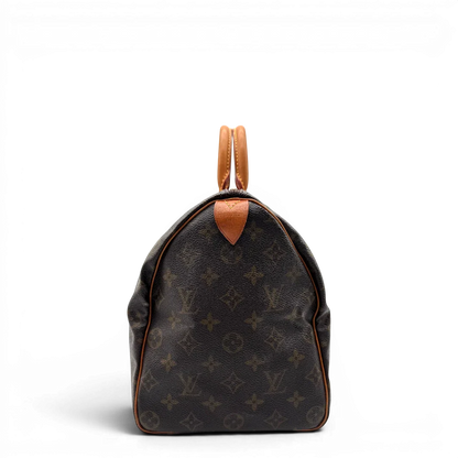 https://cdn.shopify.com/s/files/1/0564/9376/8855/files/Louis_Vuitton_Handtasche_Speedy_35_monogram_braun_vintage_LV1710.webp?v=1779408579