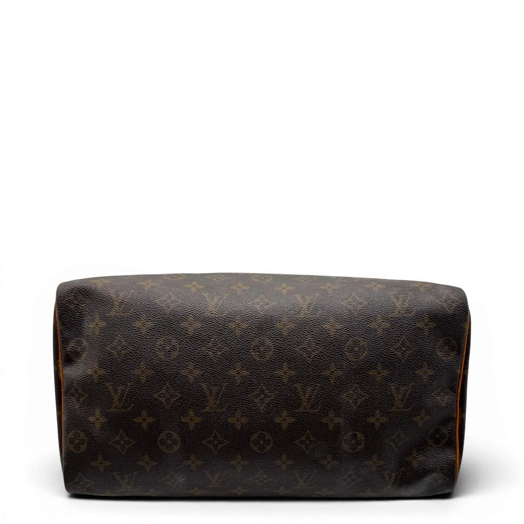 https://cdn.shopify.com/s/files/1/0564/9376/8855/files/Louis_Vuitton_Handtasche_Speedy_35_monogram_braun_vintage_LV1712.webp?v=1779408580