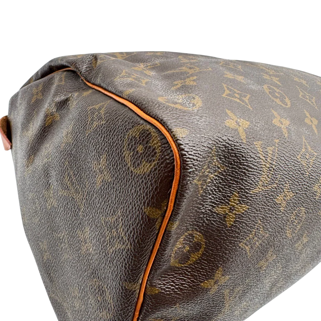https://cdn.shopify.com/s/files/1/0564/9376/8855/files/Louis_Vuitton_Handtasche_Speedy_35_monogram_braun_vintage_LV1713.webp?v=1779408580