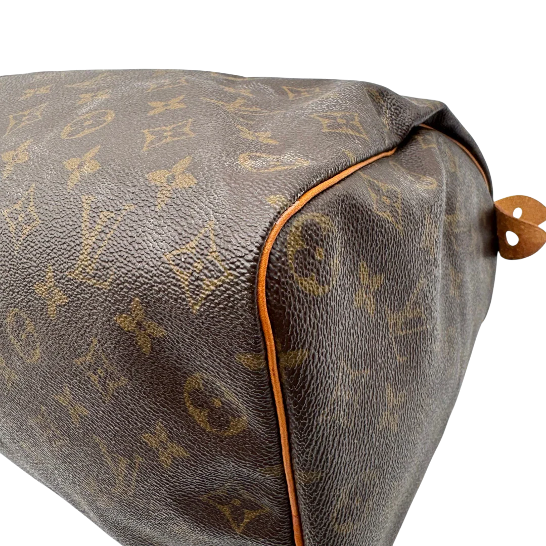 https://cdn.shopify.com/s/files/1/0564/9376/8855/files/Louis_Vuitton_Handtasche_Speedy_35_monogram_braun_vintage_LV1714.webp?v=1779408580