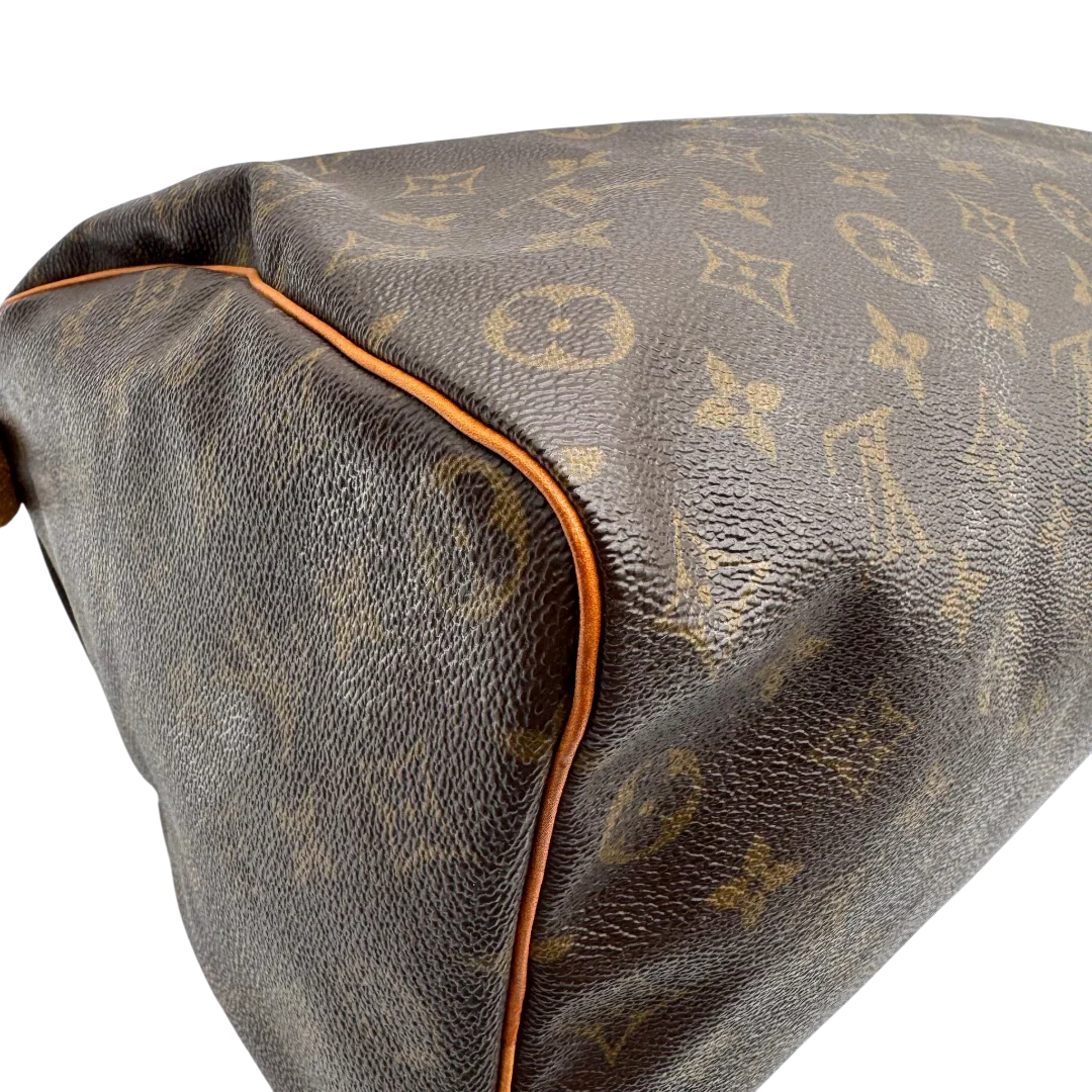 https://cdn.shopify.com/s/files/1/0564/9376/8855/files/Louis_Vuitton_Handtasche_Speedy_35_monogram_braun_vintage_LV1715.webp?v=1779408580