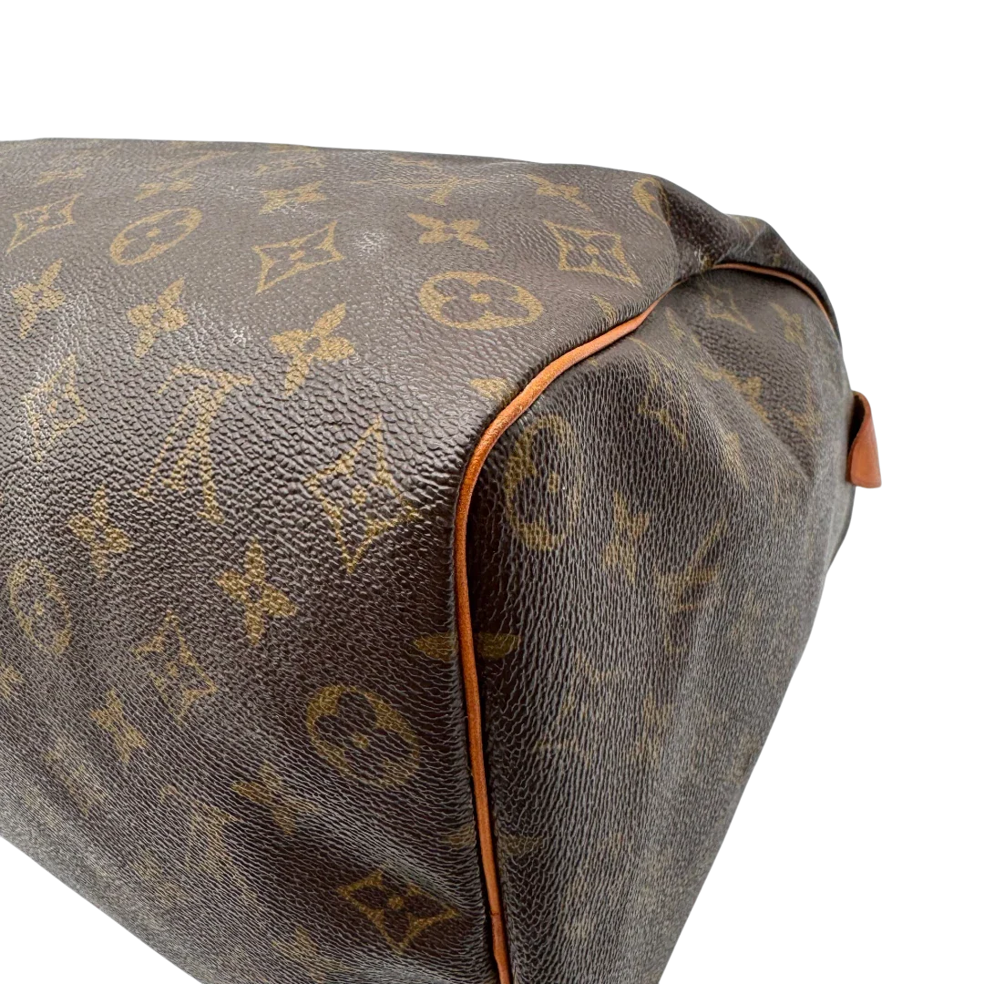 https://cdn.shopify.com/s/files/1/0564/9376/8855/files/Louis_Vuitton_Handtasche_Speedy_35_monogram_braun_vintage_LV1716.webp?v=1779408580