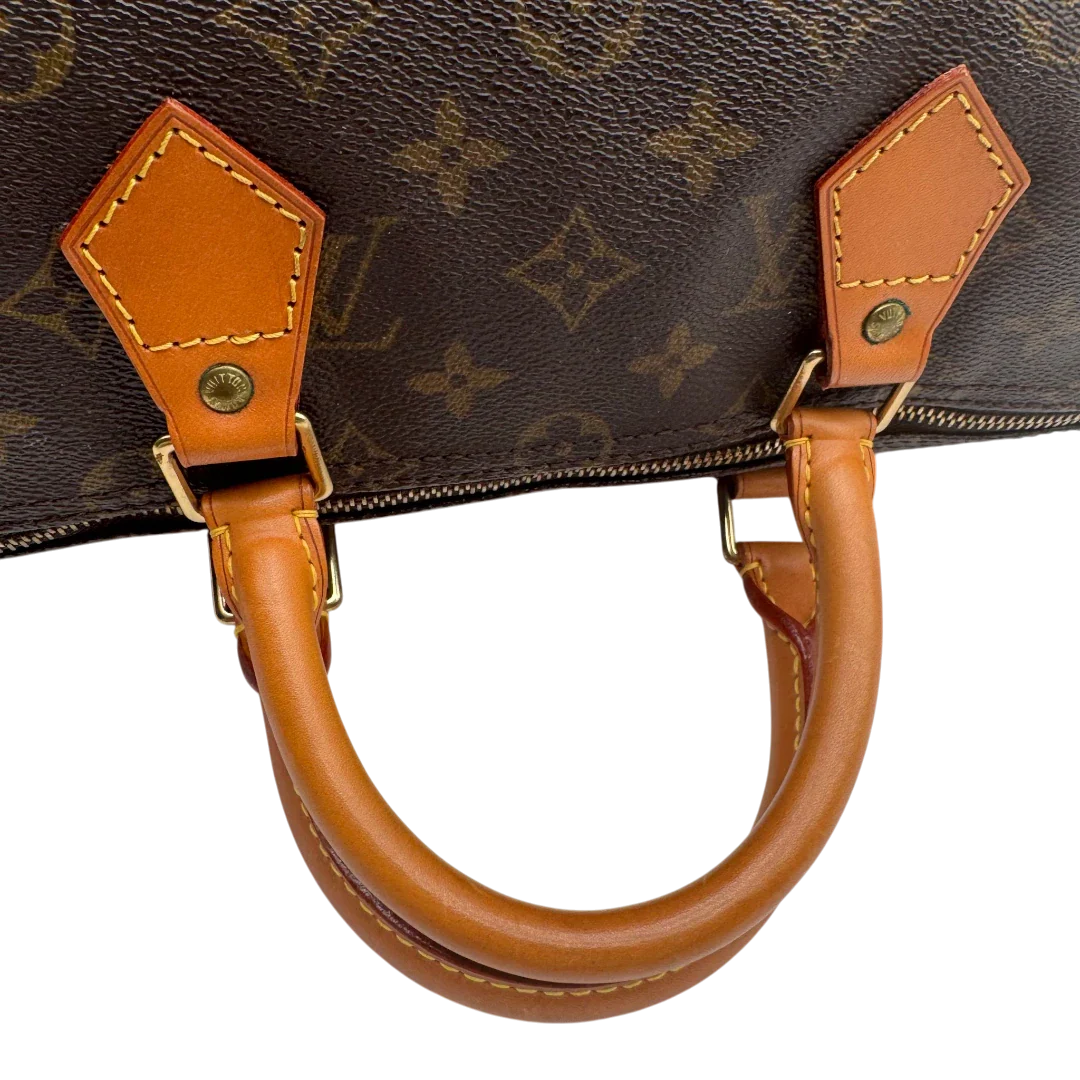 https://cdn.shopify.com/s/files/1/0564/9376/8855/files/Louis_Vuitton_Handtasche_Speedy_35_monogram_braun_vintage_LV1717.webp?v=1779408580