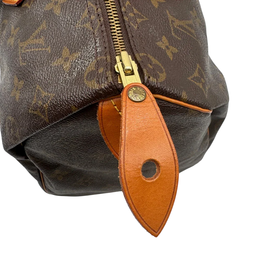 https://cdn.shopify.com/s/files/1/0564/9376/8855/files/Louis_Vuitton_Handtasche_Speedy_35_monogram_braun_vintage_LV1718.webp?v=1779408579