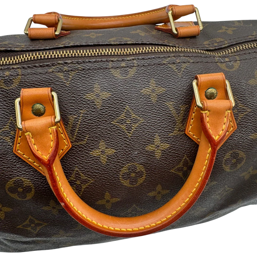 https://cdn.shopify.com/s/files/1/0564/9376/8855/files/Louis_Vuitton_Handtasche_Speedy_35_monogram_braun_vintage_LV1719.webp?v=1779408580