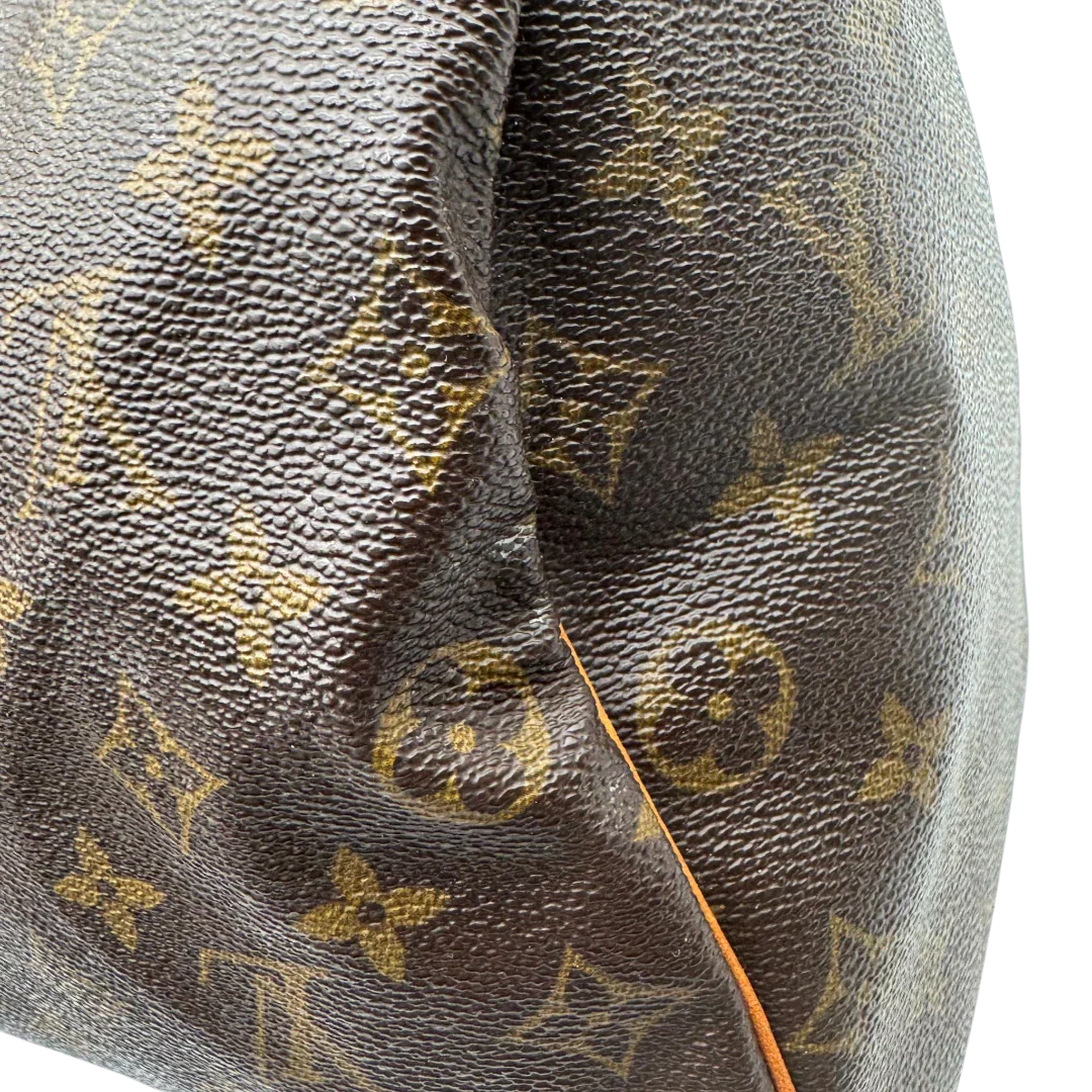 https://cdn.shopify.com/s/files/1/0564/9376/8855/files/Louis_Vuitton_Handtasche_Speedy_35_monogram_braun_vintage_LV1721.webp?v=1779408580