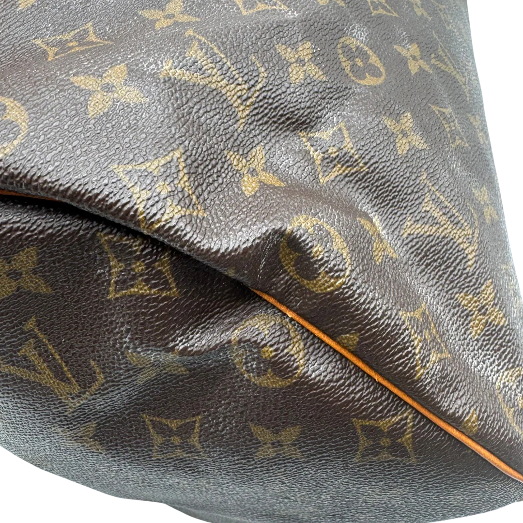 https://cdn.shopify.com/s/files/1/0564/9376/8855/files/Louis_Vuitton_Handtasche_Speedy_35_monogram_braun_vintage_LV1722.webp?v=1779408580
