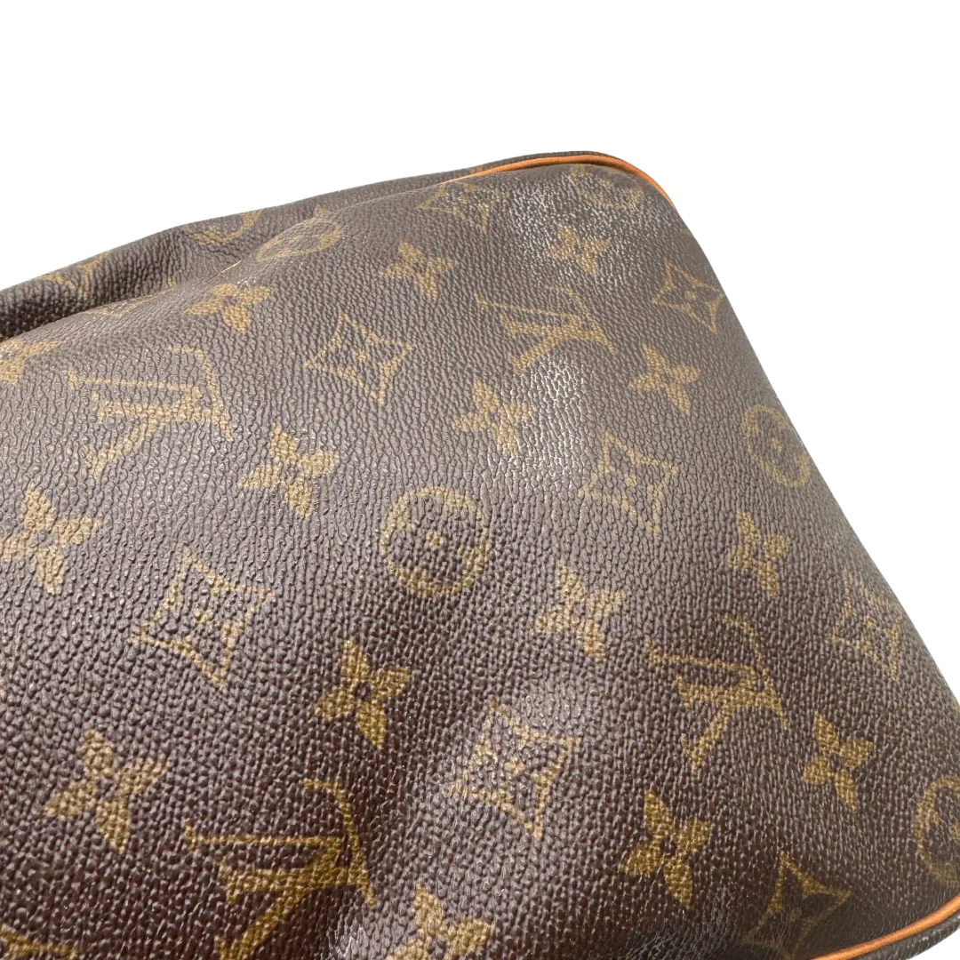 https://cdn.shopify.com/s/files/1/0564/9376/8855/files/Louis_Vuitton_Handtasche_Speedy_35_monogram_braun_vintage_LV1723.webp?v=1779408580