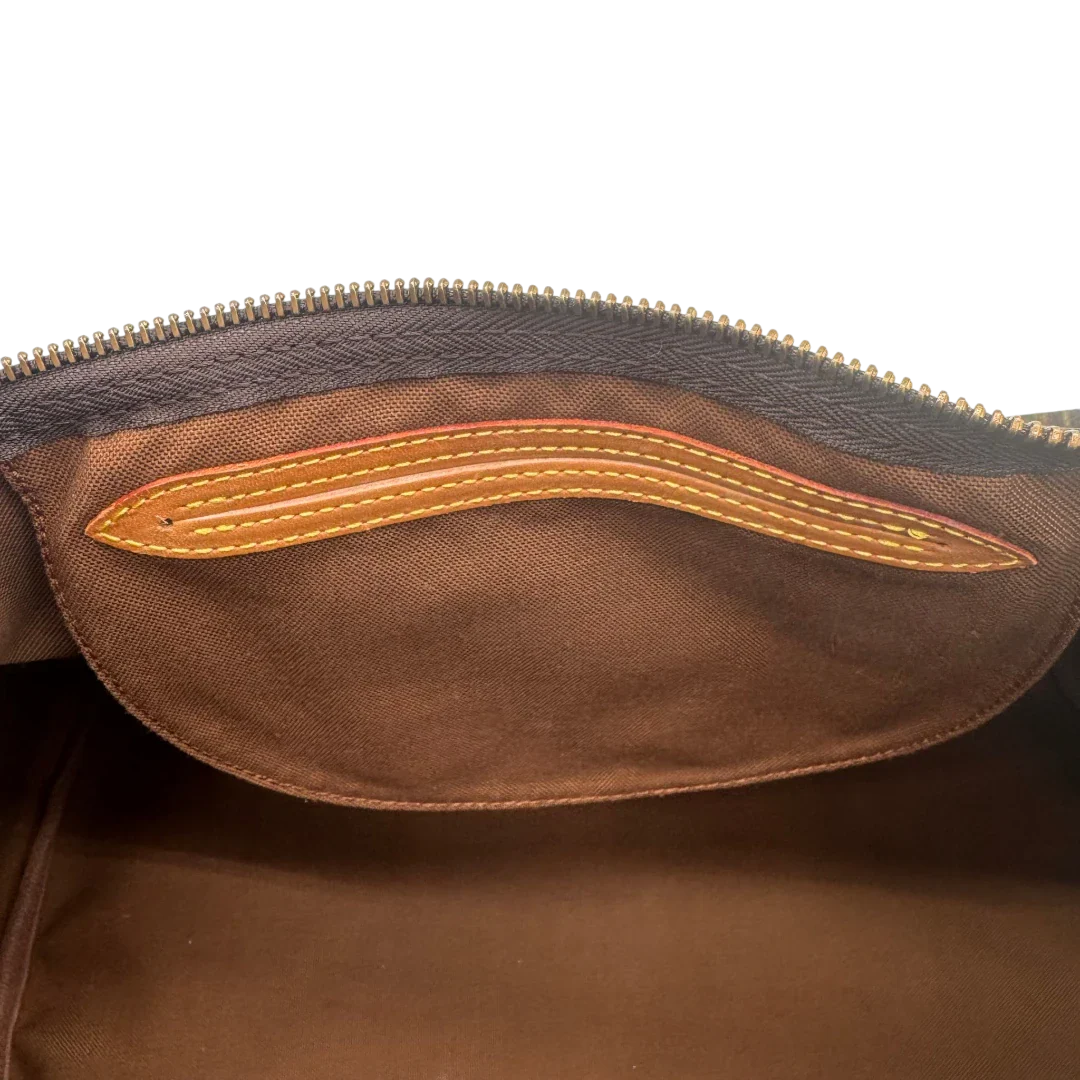 https://cdn.shopify.com/s/files/1/0564/9376/8855/files/Louis_Vuitton_Handtasche_Speedy_35_monogram_braun_vintage_LV1725.webp?v=1779408580