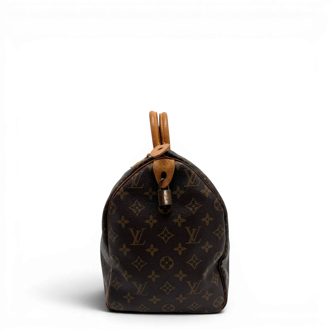 https://cdn.shopify.com/s/files/1/0564/9376/8855/files/Louis_Vuitton_Handtasche_Speedy_40_monogram_braun_vintage_LV2263.webp?v=1779969022