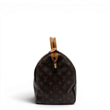 https://cdn.shopify.com/s/files/1/0564/9376/8855/files/Louis_Vuitton_Handtasche_Speedy_40_monogram_braun_vintage_LV2263.webp?v=1779969022