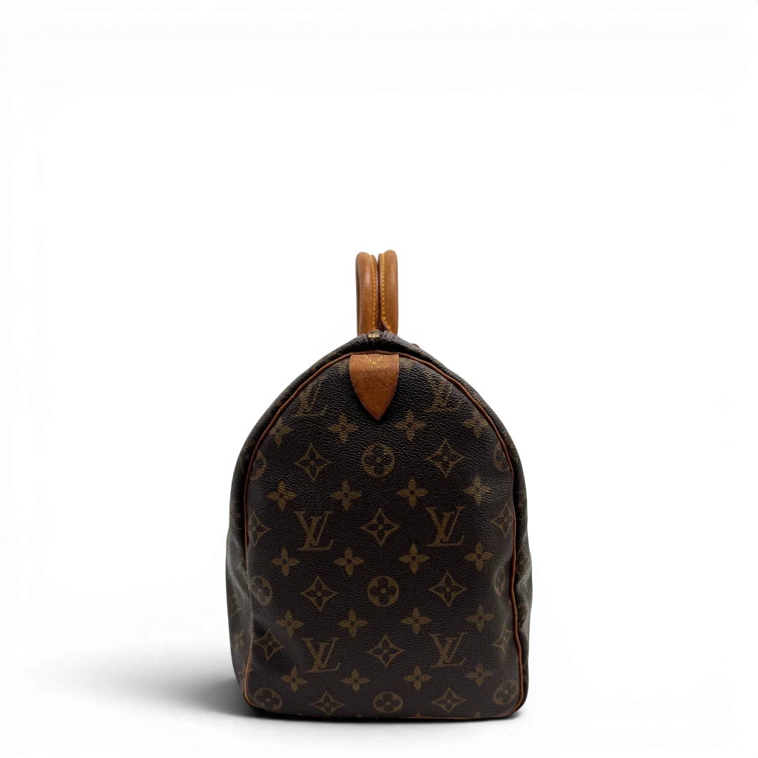 https://cdn.shopify.com/s/files/1/0564/9376/8855/files/Louis_Vuitton_Handtasche_Speedy_40_monogram_braun_vintage_LV2264.webp?v=1779969022