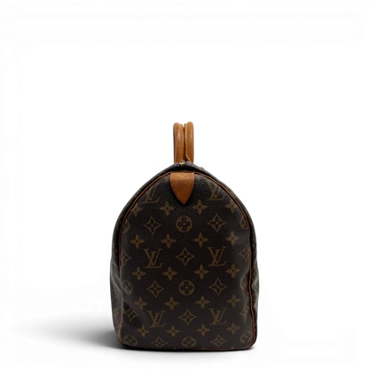 https://cdn.shopify.com/s/files/1/0564/9376/8855/files/Louis_Vuitton_Handtasche_Speedy_40_monogram_braun_vintage_LV2264.webp?v=1779969022