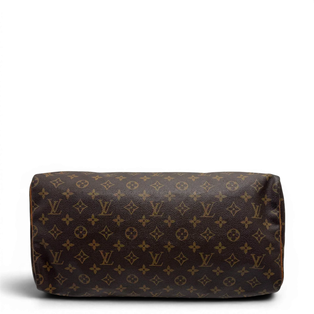 https://cdn.shopify.com/s/files/1/0564/9376/8855/files/Louis_Vuitton_Handtasche_Speedy_40_monogram_braun_vintage_LV2266.webp?v=1779969022
