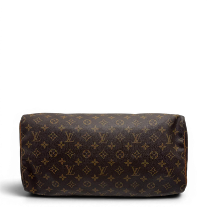 https://cdn.shopify.com/s/files/1/0564/9376/8855/files/Louis_Vuitton_Handtasche_Speedy_40_monogram_braun_vintage_LV2266.webp?v=1779969022