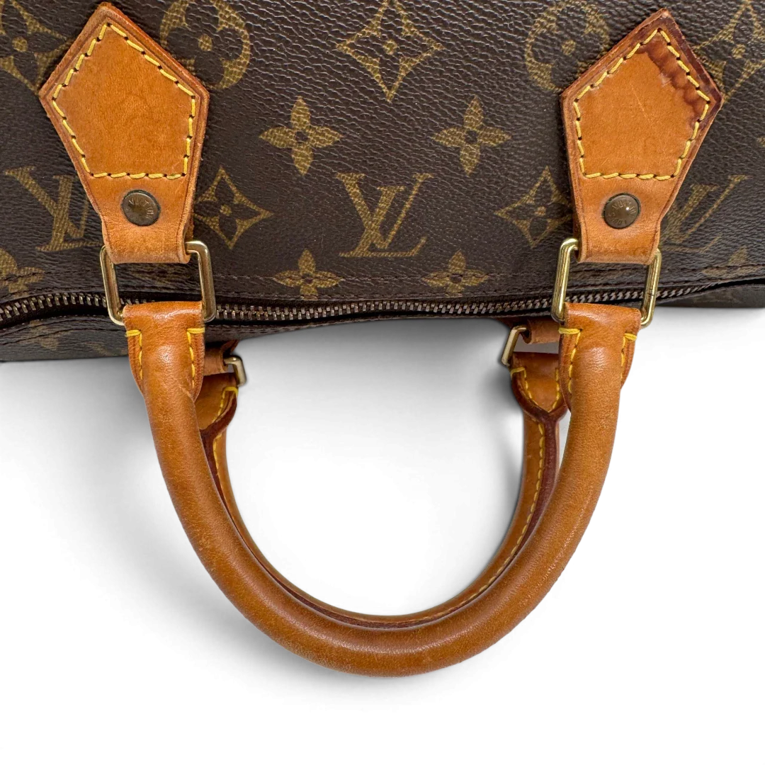 https://cdn.shopify.com/s/files/1/0564/9376/8855/files/Louis_Vuitton_Handtasche_Speedy_40_monogram_braun_vintage_LV2271.webp?v=1779969022