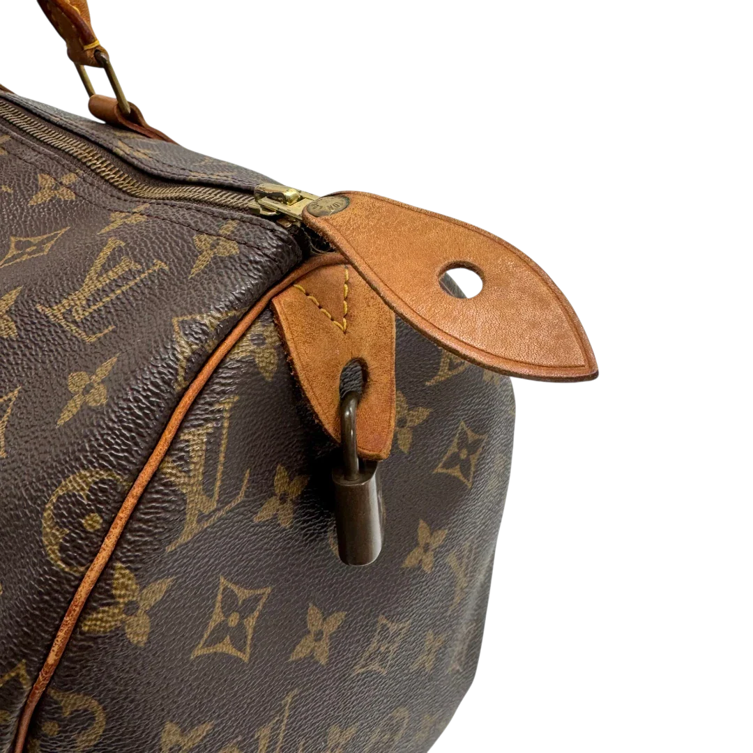 https://cdn.shopify.com/s/files/1/0564/9376/8855/files/Louis_Vuitton_Handtasche_Speedy_40_monogram_braun_vintage_LV2272.webp?v=1779969022