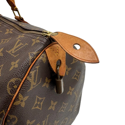 https://cdn.shopify.com/s/files/1/0564/9376/8855/files/Louis_Vuitton_Handtasche_Speedy_40_monogram_braun_vintage_LV2272.webp?v=1779969022