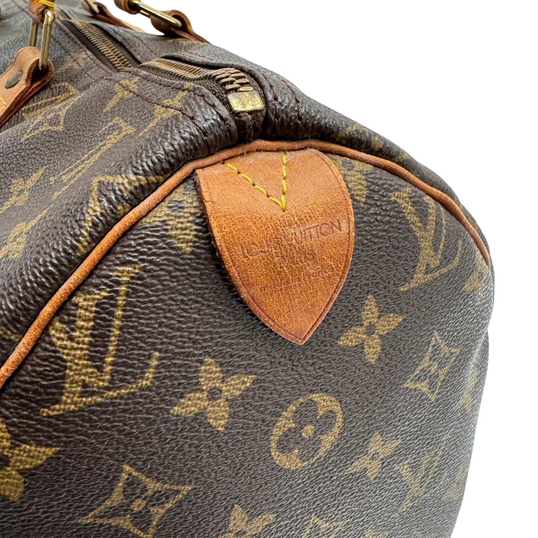 https://cdn.shopify.com/s/files/1/0564/9376/8855/files/Louis_Vuitton_Handtasche_Speedy_40_monogram_braun_vintage_LV2273.webp?v=1779969023