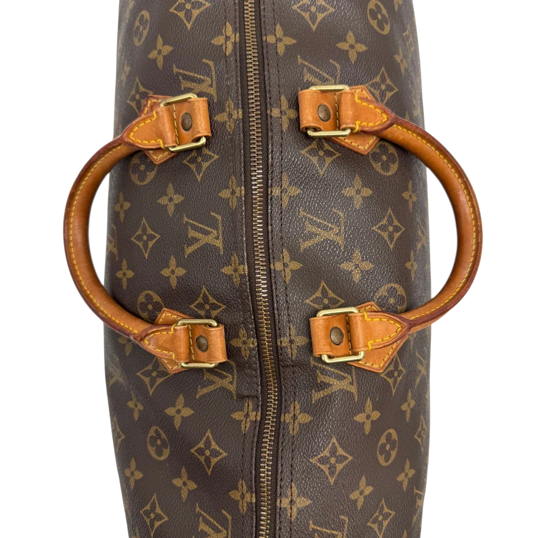 https://cdn.shopify.com/s/files/1/0564/9376/8855/files/Louis_Vuitton_Handtasche_Speedy_40_monogram_braun_vintage_LV2277.webp?v=1779969022