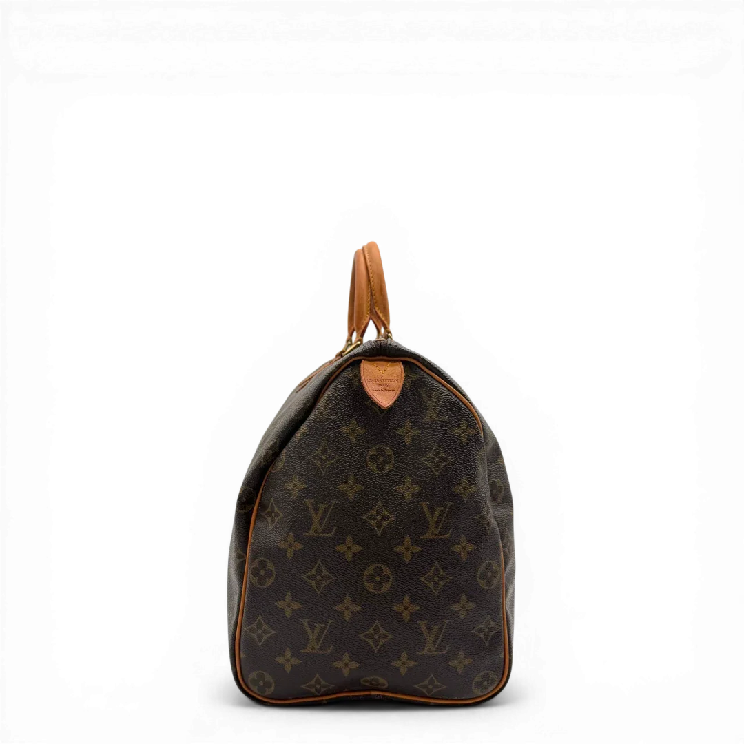 https://cdn.shopify.com/s/files/1/0564/9376/8855/files/Louis_Vuitton_Handtasche_Speedy_40_monogram_braun_vintage_LV4426.webp?v=1775654736