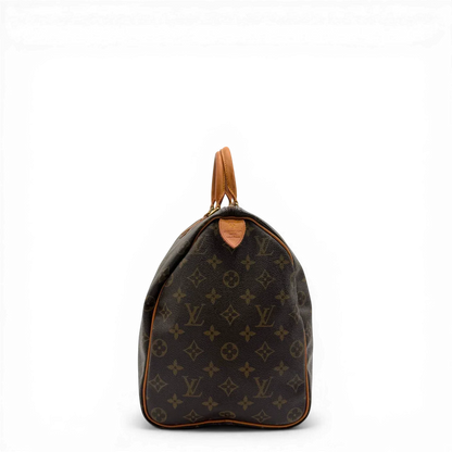 https://cdn.shopify.com/s/files/1/0564/9376/8855/files/Louis_Vuitton_Handtasche_Speedy_40_monogram_braun_vintage_LV4426.webp?v=1775654736