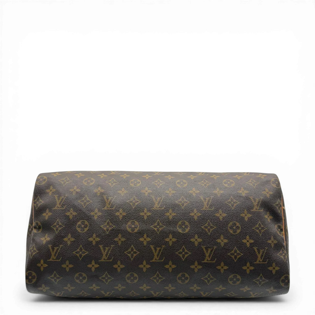 https://cdn.shopify.com/s/files/1/0564/9376/8855/files/Louis_Vuitton_Handtasche_Speedy_40_monogram_braun_vintage_LV4428.webp?v=1775654736