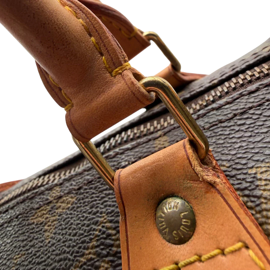 https://cdn.shopify.com/s/files/1/0564/9376/8855/files/Louis_Vuitton_Handtasche_Speedy_40_monogram_braun_vintage_LV4437.webp?v=1775654737