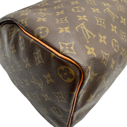 https://cdn.shopify.com/s/files/1/0564/9376/8855/files/Louis_Vuitton_Handtasche_Speedy_40_monogram_braun_vintage_LV_2234.webp?v=1769738650