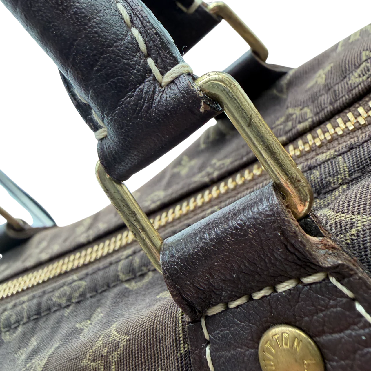 https://cdn.shopify.com/s/files/1/0564/9376/8855/files/Louis_Vuitton_Handtasche_Speedy_Mini_Lin_30_monogram_braun_vintage_LV_handbag3387.webp?v=1764858417