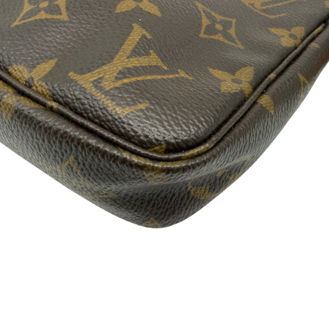 https://cdn.shopify.com/s/files/1/0564/9376/8855/files/Louis_Vuitton_Pochette_Accessoires_monogram_braun_vintage_LV7157.webp?v=1778680032