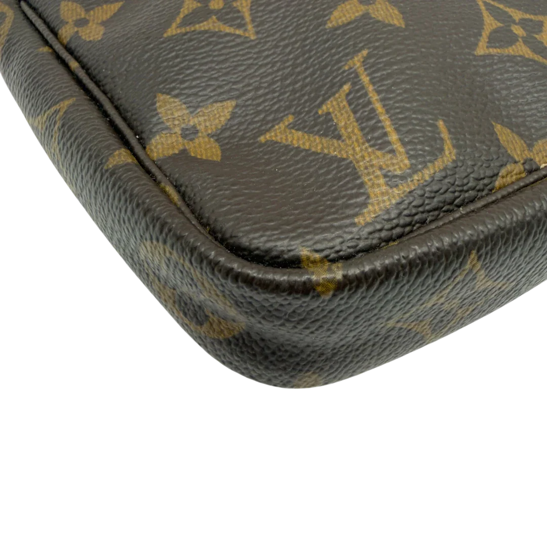 https://cdn.shopify.com/s/files/1/0564/9376/8855/files/Louis_Vuitton_Pochette_Accessoires_monogram_braun_vintage_LV7158.webp?v=1778680032