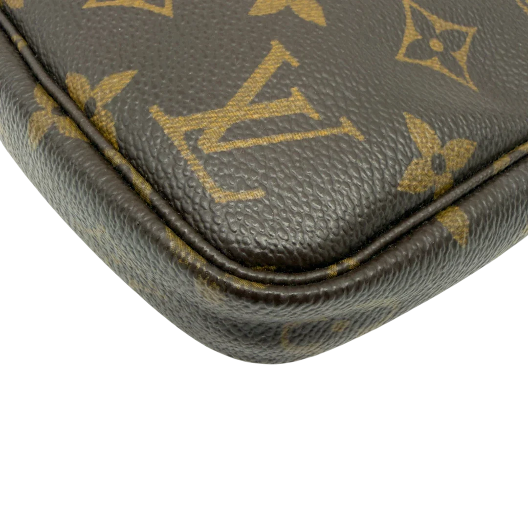 https://cdn.shopify.com/s/files/1/0564/9376/8855/files/Louis_Vuitton_Pochette_Accessoires_monogram_braun_vintage_LV7159.webp?v=1778680033