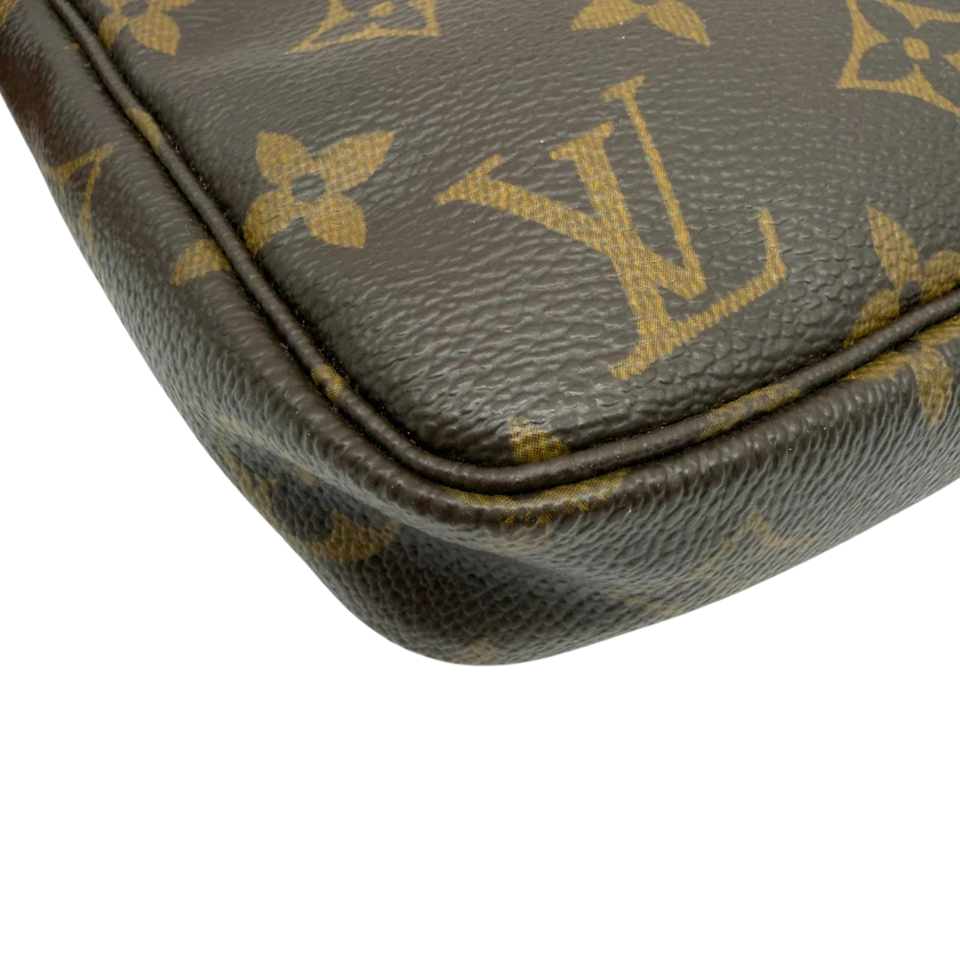 https://cdn.shopify.com/s/files/1/0564/9376/8855/files/Louis_Vuitton_Pochette_Accessoires_monogram_braun_vintage_LV7160.webp?v=1778680033