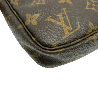 https://cdn.shopify.com/s/files/1/0564/9376/8855/files/Louis_Vuitton_Pochette_Accessoires_monogram_braun_vintage_LV7160.webp?v=1778680033