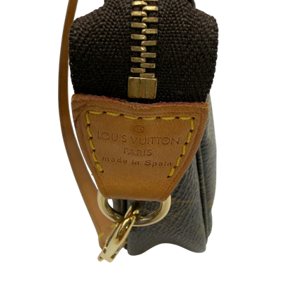 https://cdn.shopify.com/s/files/1/0564/9376/8855/files/Louis_Vuitton_Pochette_Accessoires_monogram_braun_vintage_LV7182.webp?v=1778681552
